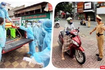 Đầu các tuyến đường đều có lực lượng kiểm tra giấy thông hành của người dân - Ảnh: Hoàng Anh 