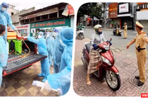 Đầu các tuyến đường đều có lực lượng kiểm tra giấy thông hành của người dân - Ảnh: Hoàng Anh 