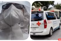 Đoàn vận chuyển người bệnh đi cách ly điều trị bị ùn tắc bên ngoài Bệnh viện Dã chiến - Ảnh: Hoà Bình chụp màn hình video