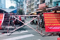 Phong toả khu chợ tự phát Xóm Chiếu để phòng dịch, thực hiện Chỉ thị 10 - Ảnh Hoà Bình