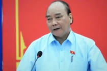 Chủ tịch nước Nguyễn Xuân Phúc tại Hội nghị tiếp xúc trực tuyến giữa tổ đại biểu Quốc hội TP.HCM với cử tri huyện Củ Chi và huyện Hóc Môn. Ảnh: Sỹ Đông