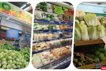 Siêu thị chất đầy hàng hoá thực phẩm nhưng người mua khó đến mua - Ảnh: Hoà Bình