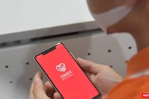 Người dân TP.HCM được nhắc tiêm vaccine qua tin nhắn - Ảnh BYT