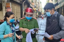 Điều tra truy vết tại con hẻm mà gia đình bệnh nhân sinh sống tại quận 3 (Ảnh- HCDC)