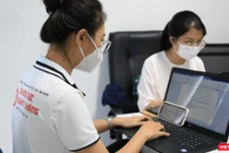 Lực lượng y tế xả thân phục vụ cộng đồng tại TP.HCM - Ảnh: HCDC