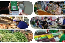 Có thẻ xanh COVID người dân vùng dịch được vào siêu thị mua hàng. Ảnh: Hoà Bình