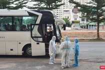 Cách ly F0 bệnh nhẹ, F1 tại nhà, theo dõi bằng phần mềm VHD - Ảnh: HCDC