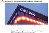 Hãng tin CNBC đưa tin Wirecard phá sản, với ảnh chụp trụ sở Wirecard tại Đức