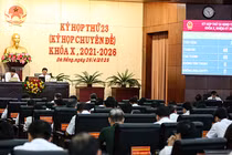 100% đại biểu HĐND TP Đà Nẵng bỏ phiếu thông qua Nghị quyết sáp nhập Đà Nẵng và Quảng Nam.