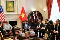 Bộ trưởng Nguyễn Chí Dũng làm việc với tiến sĩ Richard Lawton Thurston (ảnh: MPI)