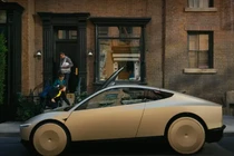 Xe taxi robot của Tesla được trưng bày tại sự kiện ra mắt ở Los Angeles, California (Ảnh: Reuters)