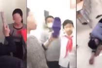 Hình ảnh cô giáo bị nhóm học sinh dồn vào góc lớp, ném dép (ảnh cắt từ clip).