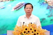 Chủ tịch UBND TPHCM Phan Văn Mãi phát biểu tại hội nghị. Ảnh: Việt Dũng