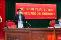 Bộ trưởng Nguyễn Thanh Long cùng Bí thư Tỉnh uỷ Hải Dương Phạm Xuân Thăng chủ trì hội nghị trực tuyến tại vùng dịch Hải Dương.