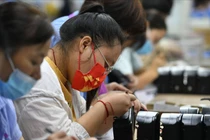 Tuyển dụng tại một hội chợ việc làm ở Bắc Kinh, Trung Quốc (Ảnh: Getty)