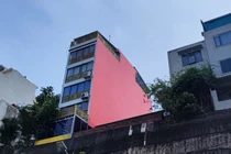 Thực hư chuyện dân sơn cờ Tổ quốc trên tường, cán bộ bắt xóa