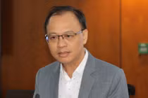 Ông Võ Minh Tuấn, Giám đốc NHNN Việt Nam, Chi nhánh TP.HCM trả lời tại buổi họp báo. Ảnh: Hồ Văn
