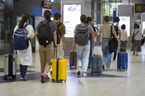 Đi du lịch nước ngoài bắt đầu nóng lên ở Trung Quốc vào dịp nghỉ lễ Quốc khánh kéo dài 8 ngày (Ảnh: Sohu)