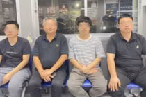 4 người đàn ông Trung Quốc lấy tài liệu bị bắt. Ảnh: SingTao.