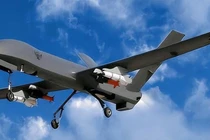 Máy bay không người lái được gắn tên lửa đẩy phụ. Ảnh: Sohu.