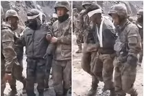 Hình ảnh binh sĩ Ấn Độ bị thương bị lính Trung Quốc bắt dẫn giải (Ảnh: Đông Phương).