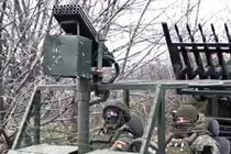 Một kiểu chiến xa với dàn phóng đạn ria phía trước và 6 khẩu AK-12 kết thành dàn phía sau. Ảnh: QQnews.