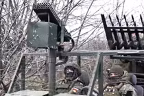 Một kiểu chiến xa với dàn phóng đạn ria phía trước và 6 khẩu AK-12 kết thành dàn phía sau. Ảnh: QQnews.