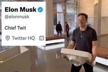 Đoạn tweet đầu tiên của Elon Musk sau khi sở hữu Twitter (Ảnh: Timeweekly).