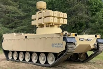 Toàn bộ hệ thống phóng tên lửa tầm xa Akeron LP trên xe robot Type-X. Ảnh: NetEase.