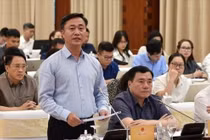 Thứ trưởng Bộ Xây dựng Nguyễn Việt Hùng trả lời về các giải pháp đối với thị trường bất động sản. (Ảnh: VGP)