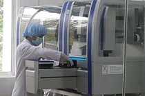 Hệ thống Realtime PCR tự động xét nghiệm Covid-19 tỉnh Quảng Nam mua với giá 7,2 tỷ đồng. Ảnh: SGGP