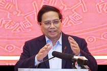 Thủ tướng Phạm Minh Chính tại buổi làm việc với Ban Thường vụ Thành ủy Đà Nẵng vào đêm qua (9/2). Ảnh VGP