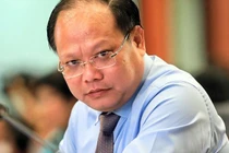 Ông Tất Thành Cang tại cuộc họp HĐND TP.HCM hồi tháng 4/2019. Ảnh: Hữu Khoa. 