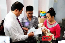 Đã có 8.705 trẻ em tại Đà Nẵng được trao giấy khai sinh, thẻ bảo hiểm y tế, hộ khẩu tại gia đình.