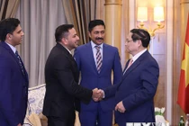 Thủ tướng Phạm Minh Chính tiếp ông Shehim Kottilingal, Giám đốc Tập đoàn Lulu quốc tế và các lãnh đạo tập đoàn. (Ảnh: Dương Giang/TTXVN)