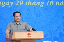 Thủ tướng Phạm Minh Chính chủ trì Hội nghị Tổng kết công tác Phòng, Chống dịch COVID-19. (Ảnh: Dương Giang/TTXVN)