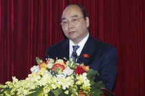 Chủ tịch nước Nguyễn Xuân Phúc, Trưởng Ban Chỉ đạo Cải cách tư pháp Trung ương phát biểu tại hội thảo khoa học.