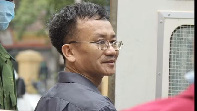 Bị cáo Nguyễn Quang Vinh bị cáo buộc chủ mưu vụ nâng điểm, VKS đề nghị mức án 7 đến 8 năm tù. Ảnh: Zing