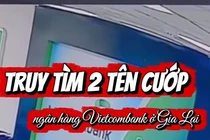 Cầm vật giống súng uy hiếp, 2 tên cướp lấy nhiều cọc tiền ở ngân hàng Vietcombank