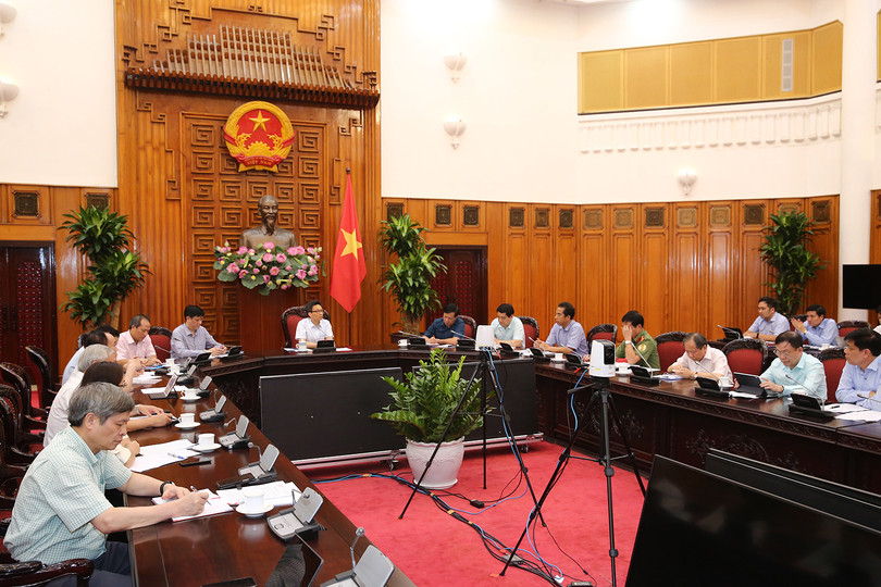 Phó Thủ tướng Vũ Đức Đam chủ trì cuộc họp Ban Chỉ đạo Quốc gia phòng, chống dịch COVID-19. Ảnh: VGP/Đình Nam