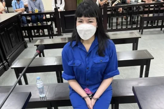 Bị cáo Vũ Thị Thu Nhung, cựu Phó giám đốc Eximbank chi nhánh Ba Đình. Ảnh: N.L.