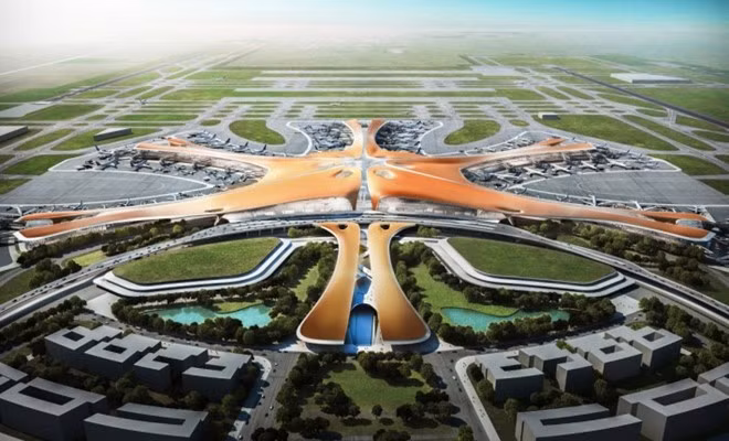 Sân bay quốc tế Đại Hưng Bắc Kinh- Chi phí: 13 tỷ USD Với mục tiêu giảm tải cho sân bay quốc tế thủ đô Bắc Kinh, dự án sân bay Đại Hưng Bắc Kinh khởi công vào năm 2014 và dự kiến hoàn thành vào 2025. Được thiết kế bởi kiến trúc sư Zaha Hadid, sân bay này sẽ có 7 đường băng và nhà ga lớn nhất thế giới. có thể phục vụ 100 triệu lượt khách mỗi năm. Ảnh: Asiarisingtv. Sân bay quốc tế Đại Hưng Bắc Kinh- Chi phí: 13 tỷ USD Với mục tiêu giảm tải cho sân bay quốc tế thủ đô Bắc Kinh, dự án sân bay Đại Hưng Bắc Kinh khởi công vào năm 2014 và dự kiến hoàn thành vào 2025. Được thiết kế bởi kiến trúc sư Zaha Hadid, sân bay này sẽ có 7 đường băng và nhà ga lớn nhất thế giới. có thể phục vụ 100 triệu lượt khách mỗi năm. Ảnh: Asiarisingtv.