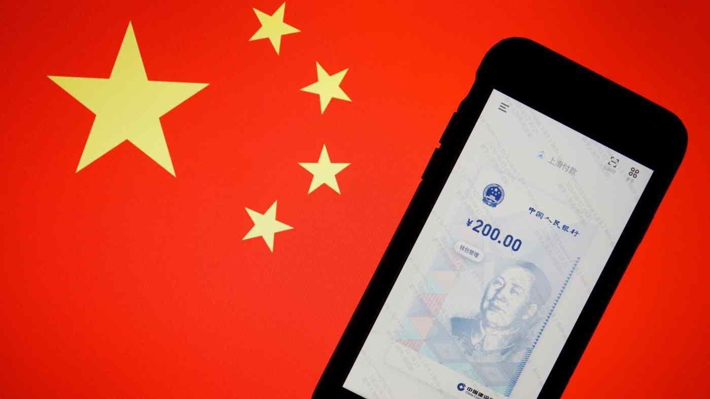 Việc mở rộng sử dụng đồng tiền số của Trung Quốc mang tới nhiều cơ hội, nhưng cũng không ít thách thức (Ảnh: Reuters)