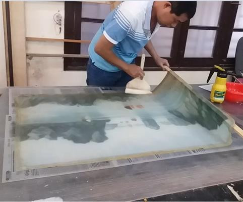 Quá trình tu sửa tranh lụa "Vịnh Hạ Long"