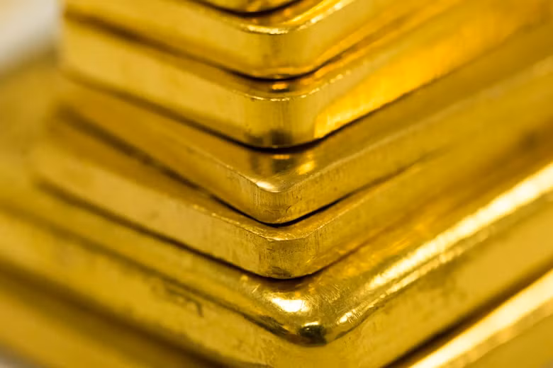 Giá vàng thế giới sáng 8/10 giảm xuống 4.113 USD/ounce, thấp hơn khoảng 55 USD/ounce so với sáng 7/10. Ảnh: Bloomberg.