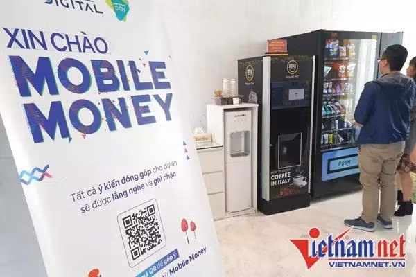 Đề án triển khai thí điểm dùng tài khoản viễn thông thanh toán cho các hàng hóa, dịch vụ có giá trị nhỏ (Mobile Money) có hiệu lực từ ngày 9/3/2021. Ảnh: Trọng Đạt