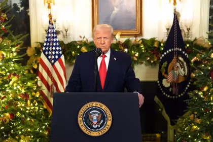 Tổng thống Mỹ Donald Trump phát biểu trước toàn quốc từ Nhà Trắng ở Washington, D.C., ngày 17/12. Ảnh: AFP.