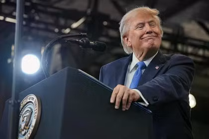 Tổng thống Donald Trump phát biểu tại Trung tâm Huấn luyện và Tình báo David S. Mack ở Garden City, New York, Mỹ, ngày 14/8. Ảnh: Reuters.