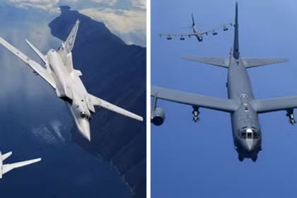 Máy bay ném bom Tu-22M3 của Nga (bên trái) và B-52H của Mỹ. Ảnh: MW.
