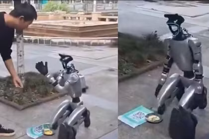 Robot hình người đi xin quyên góp trên đường phố làm dấy lên cuộc tranh luận mới về trí tuệ nhân tạo. Ảnh: MoneyControl.